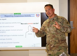 Sgt. 1st Class Elias Solano, antiterrorism / force protection noncommissioned officer, 1st Theater Sustainment Command (TSC), instructs students on how to detect suspicious behaviors during an antiterrorism awareness course, Aug. 7, 2019, at Fort Knox, Ky.