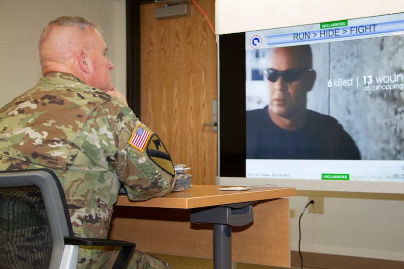A 1st Theater Sustainment Command (TSC) member listens intently as he receives instruction on what to do during an active shooter incident Aug. 7, 2019, at Fort Knox, Ky.