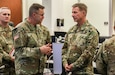 Gen. James McConville (right), U.S. Army Chief of Staff, tours the U.S. Army Central Operations Center with Lt. Gen. Terry Ferrell (left), USARCENT commanding general, at the command’s headquarters on Shaw Air Force Base, S.C., Aug. 1, 2019.