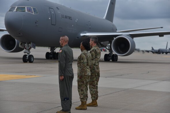 Col. Bruce Hesteltine, 931st Air Refueling Wing commander (left), Chief Master Sgt. Melissa Royster 22nd Air Refueling Wing command chief, and Col. Richard Tanner, 22nd ARW commander, salutes as the 9th KC-46A Pegasus arrives at McConnell Air Force Base, Kan. August 9, 2019. This was the 9th KC-46 to arrive at McConnell AFB since the first arrival on January 25, 2019. (U.S. Air Force photo by Airman 1st Class Marc A. Garcia)
