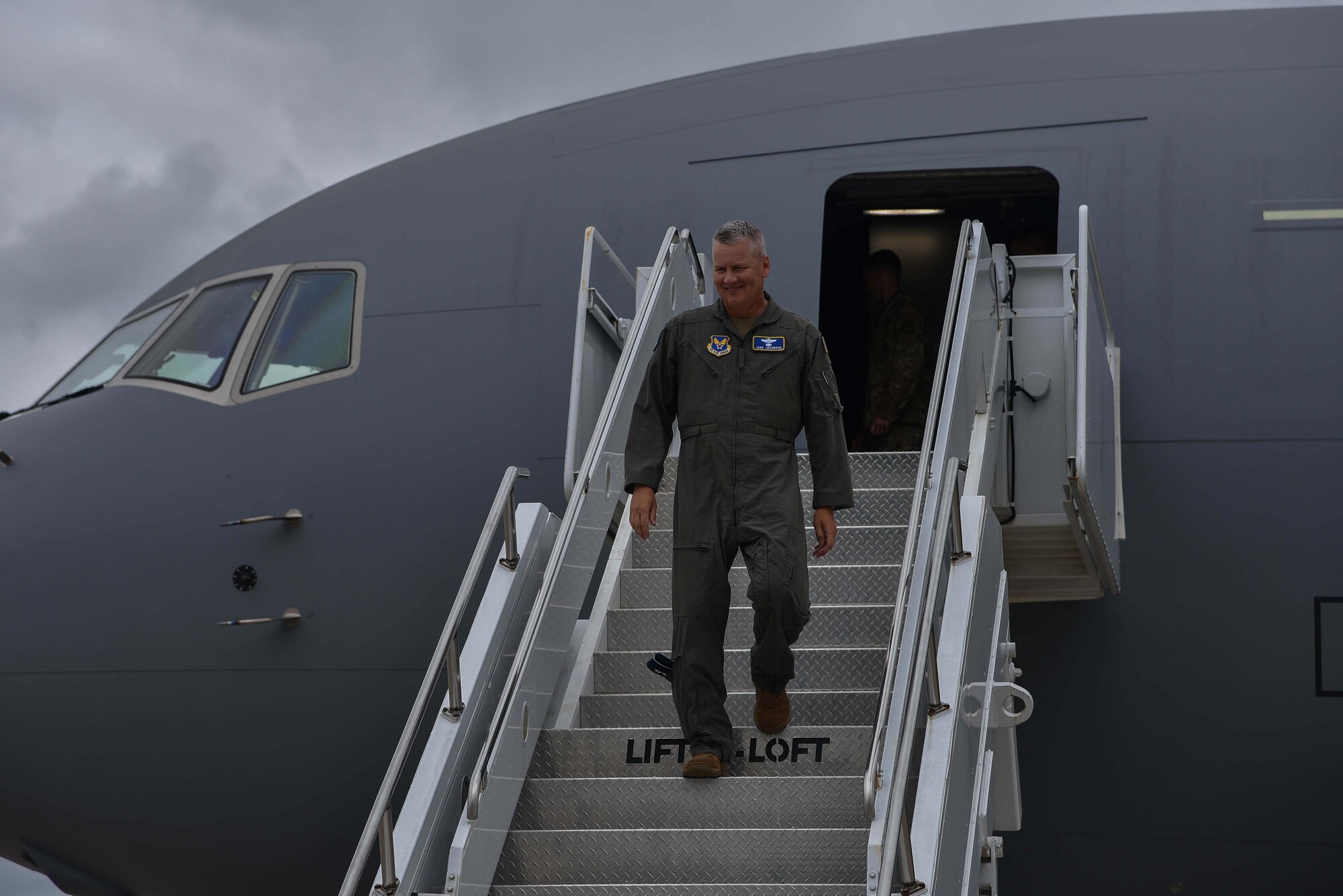 Maj. Gen. James Jacobson, Headquarters Air Force director of training and deputy chief of staff for operations, plans and requirements, departs the 9th KC-46A Pegasus delivered August 9, 2019, at McConnell Air Force Base, Kan. McConnell has now received nine out of 36 KC-46’s that will be delivered to the base. (U.S. Air Force photo by Airman 1st Class Marc A. Garcia)