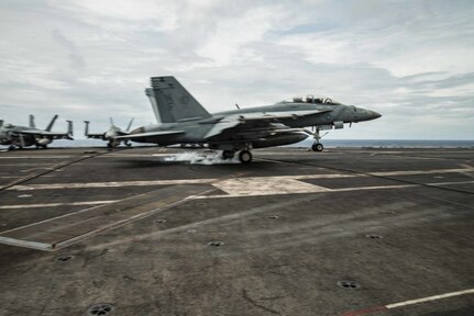 SOUTH CHINA SEA (August 6, 2019) An F/A-18F Super Hornet, piloted by Cmdr. Harry Evans, commanding officer of Strike Fighter Squadron (VFA) 102, lands on the flight deck of the Navy™s forward-deployed aircraft carrier USS Ronald Reagan (CVN 76). This was Evans™ 1,000th arrested carrier landing. Ronald Reagan, the flagship of Carrier Strike Group 5, provides a combat-ready force that protects and defends the collective maritime interests of its allies and partners in the Indo-Pacific region.