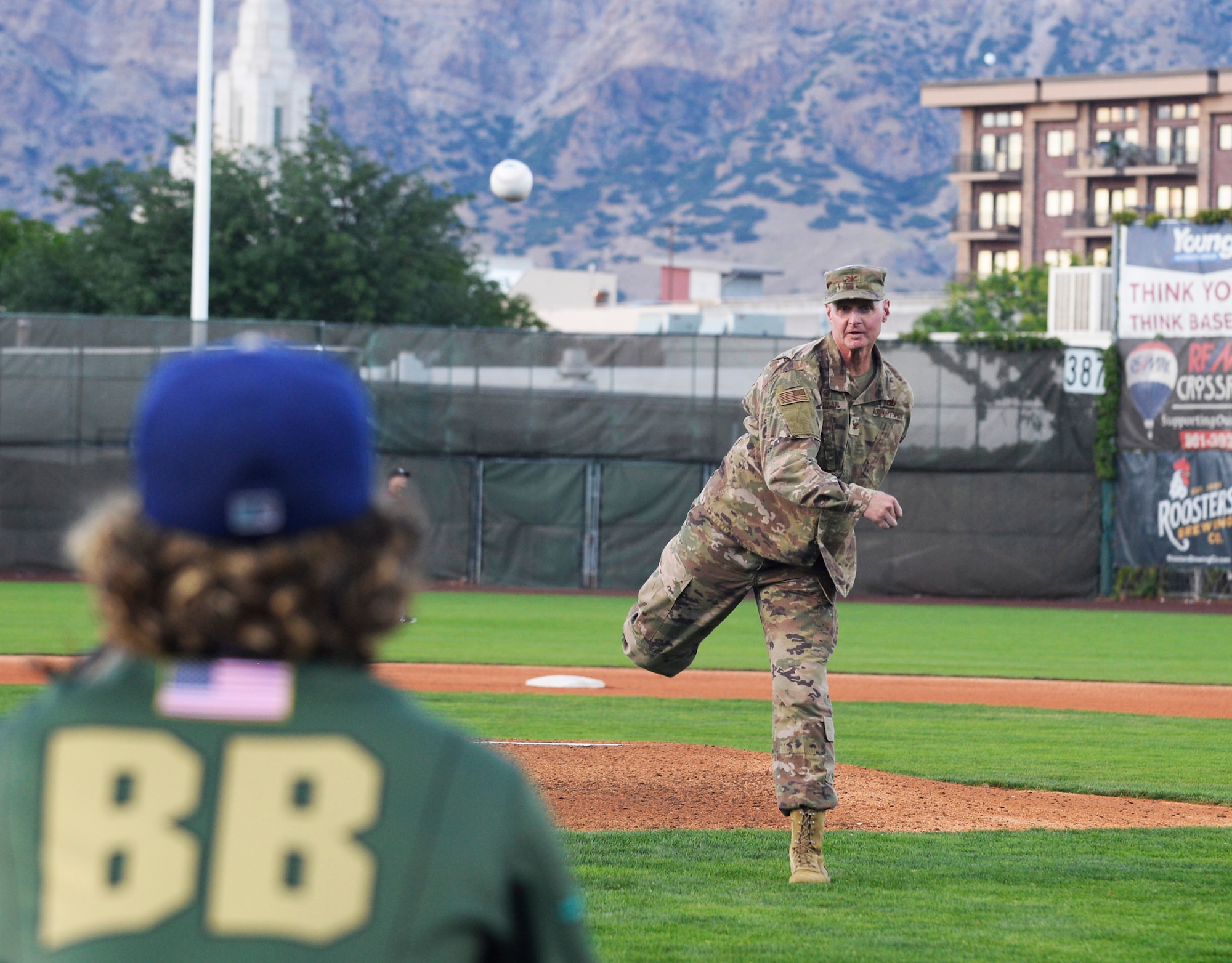 Col. Jon Eberlan, 75th Air Base Wing commander, throws the ceremonial first pitch b Aug. 9, 2019, before Military Appreciation Night with the Ogden Raptors and Idaho Falls Chuckars at Lindquist Field in Ogden, Utah. Each year, the Raptors and Top of Utah Military Affairs Committee offer tickets to Hill Air Force Base personnel and their families. (U.S. Air Force photo by David Perry)