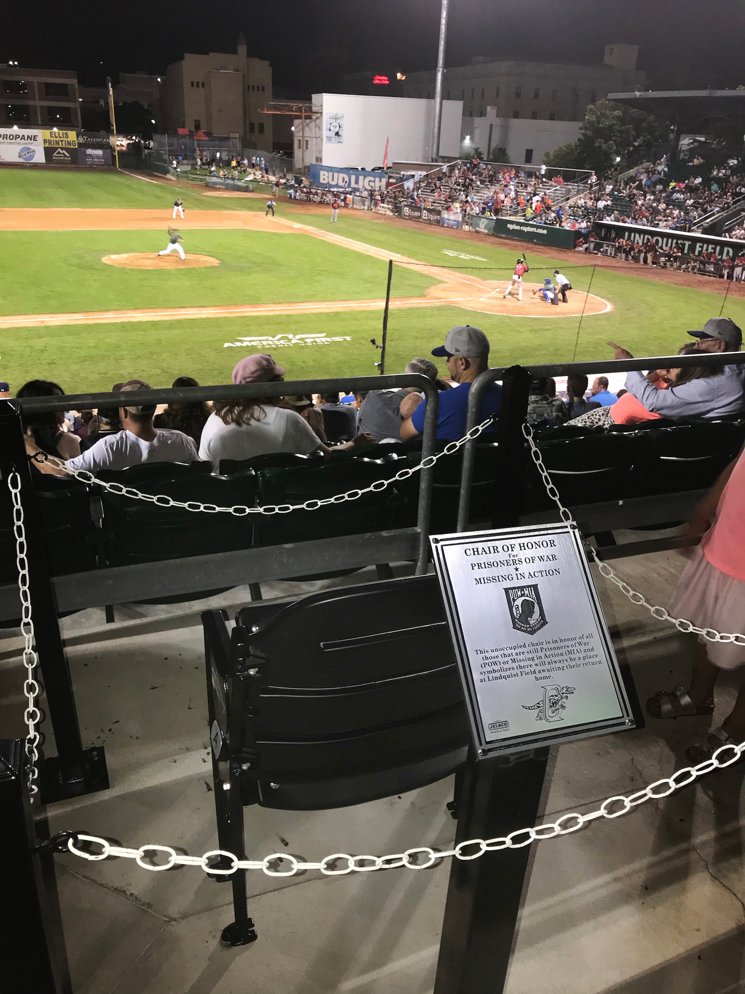 The POW/MIA chair of honor at Lindquist Field in Ogden, Utah. The chair was dedicated Aug. 9, 2019, during Military Appreciation Night with the Ogden Raptors and Idaho Falls Chukars to symbolize that there will always be a place at Lindquist Field awaiting the return home of the nation's POWs/MIAs. (U.S. Air Force photo by David Perry)