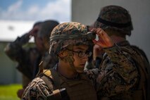 U.S. Marine Corps Lance Cpl. Keven Temple prepares to enter a mass casualty simulation at the Tactical Medical Simulation Center on Camp Hansen, Okinawa, Japan, August 1, 2019. The Tactical Combat Casualty Care course teaches first responders to treat casualties in the proper order, treating the most critical situations first to reduce deaths at the point of injury. Temple, a native of Jacksonville, Florida, is a heavy equipment mechanic with Combat Logistics Battalion 31, 31st Marine Expeditionary Unit. (U.S. Marine Corps photo by Lance Cpl. Isaiah Campbell)
