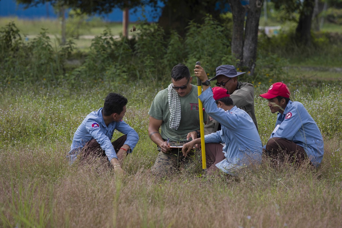 U.S. Marine Corps Sgt. Dillon M. Medeiros conducts Explosive Ordnance Disposal (EOD) Level 2 instruction for EOD Technicians with Cambodian Mine Action Center during Humanitarian Mine Actions (HMA) Cambodia in Kampong Chhnang, Cambodia, July 31, 2019. HMAs are reoccurring events that instruct partner nations’ on tactics, techniques and procedures. This instruction on EOD and tactical combat casualty care capabilities will save lives and relieve human suffering. Medeiros, a native of Honokua, Hawaii, is an Explosive Ordnance Disposal Technician with 3rd EOD Co., 9th Engineer Support Battalion, 3rd Marine Logistics Group. (U.S. Marine Corps photo by Sgt Stephanie Cervantes)