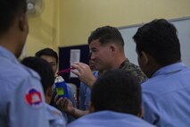 U.S. Marine Corps Sgt. Kenneth V. Fuqua explains the components of the Advanced Ordnance Teaching Material during Explosive Ordnance Disposal (EOD) Level 2 instruction for EOD Technicians with Cambodian Mine Action Center during Humanitarian Mine Actions (HMA) Cambodia in Kampong Chhnang, Cambodia, Aug 1, 2019. HMAs are reoccurring events that instruct partner nations’ on tactics, techniques and procedures. This instruction on EOD and tactical combat casualty care capabilities will save lives and relieve human suffering. Fuqua, a native of La Verna, California, is an Explosive Ordnance Disposal Technician with 3rd EOD Co., 9th Engineer Support Battalion, 3rd Marine Logistics Group. (U.S. Marine Corps photo by Sgt Stephanie Cervantes)