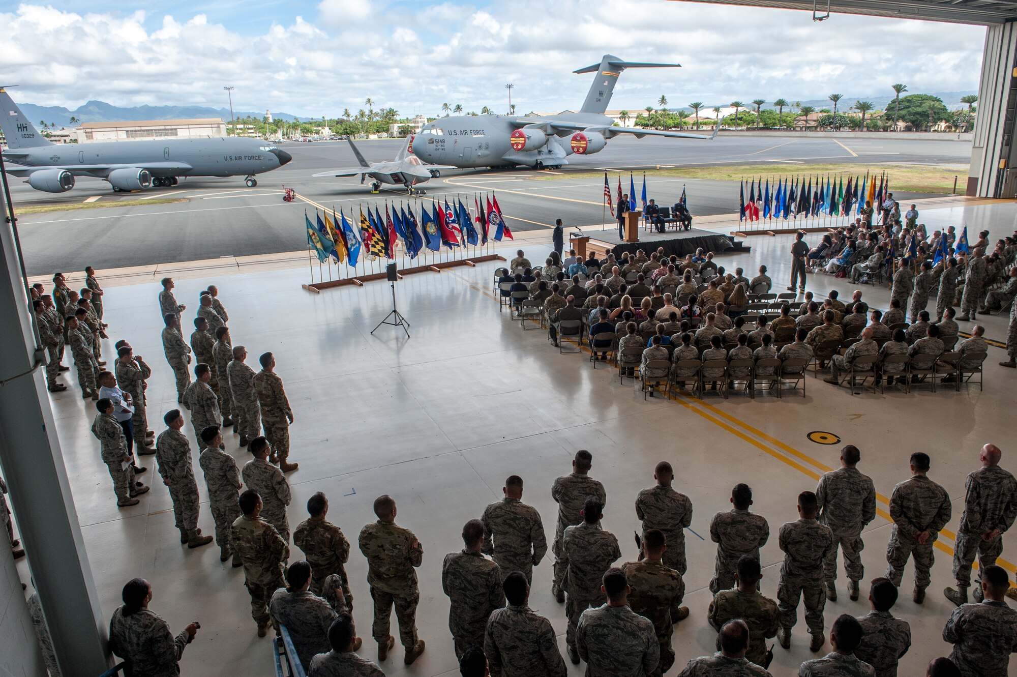 Members of the 154th Wing gather for a change of command ceremony Aug. 4, 2019, at Joint Base Pearl Harbor-Hickam. During the event, Col. Dann S. Carlson assumed command of the Hawaii Air National Guard’s 154th Wing from Brig. Gen. Gregory Woodrow.