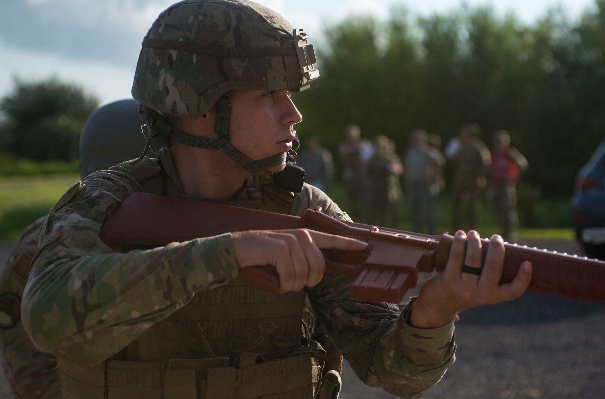 U.S. Air Force Senior Airman Weston Super, a 6th Security Forces Squadron entry controller, readies his training weapon during an active shooter exercise at MacDill Air Force Base, Fla., Aug. 8, 2019.