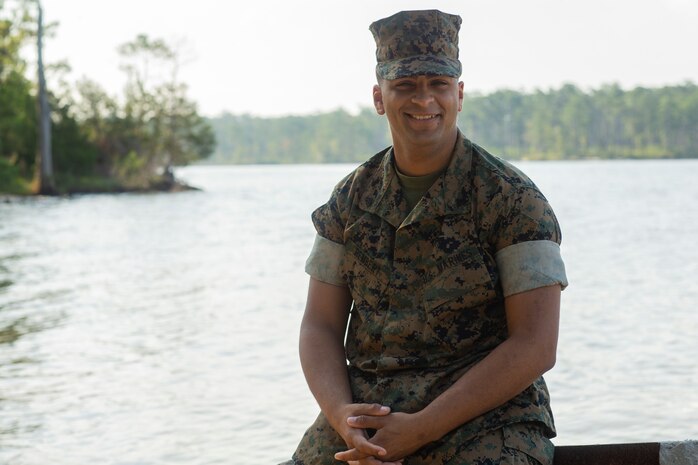 U.S. Marine Cpl. Stewart Rembert, a motor vehicle technician with Combat Logistics Battalion 8, Combat Logistics Regiment 2, 2nd Marine Logistics Group, poses for a photo at Camp Lejeune, N.C., Aug. 7, 2019. Rembert was invited to attend a retirement ceremony for FBI Special Agent Troy Sowers on Aug. 9, 2019.
