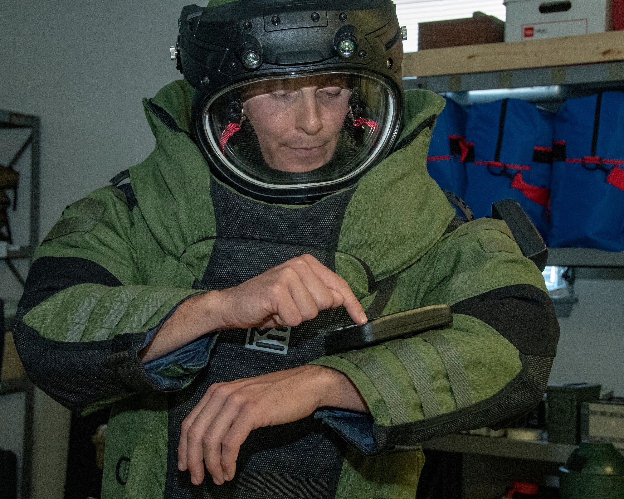 MSgt Mark Jurakovich from the 166th Airlift Wing Explosive Ordinance Disposal Unit, Delaware Air National Guard and the Outstanding Airman of the Year in the category of Senior Noncommissioned officer function tests the EOD bomb suit, Jun 6, 2019. OAY is an ANG command chief program to recognize the best of the best Airman throughout the ANG enterprise. (U.S. Air National Guard photo by Master Sgt. David J. Fenner)