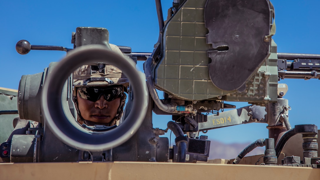 U.S. Marine Corps Lance Cpl. Christopher J. Kim, an infantry machine gunner with 1st Battalion, 25th Marine Regiment, 4th Marine Division, conducts a weapon maintenance check during Integrated Training Exercise 5-19 at Marine Corps Air Ground Combat Center Twentynine Palms, Calif., Aug. 12, 2019. ITX 5-19 is an essential component of the Marine Forces Reserve’s training and readiness cycle. It serves as the principle exercise for assessing a unit’s capabilities. (U.S. Marine Corps photo by Lance Cpl. Jose Gonzalez)