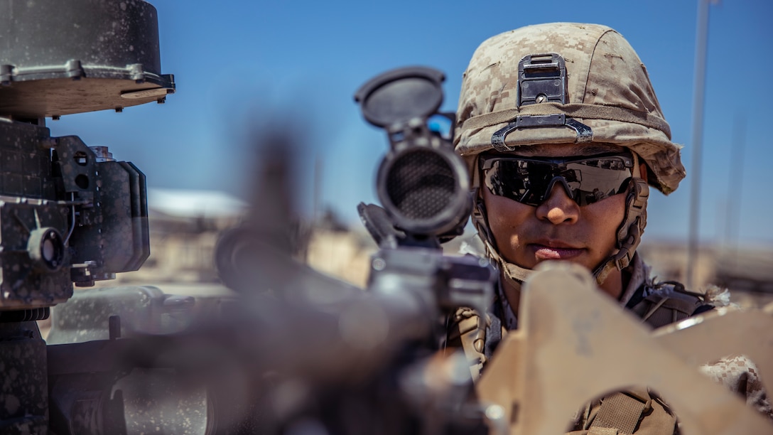 U.S. Marine Corps Lance Cpl. Christopher J. Kim, an infantry machine gunner with 1st Battalion, 25th Marine Regiment, 4th Marine Division, conducts a weapon maintenance check during Integrated Training Exercise 5-19 at Marine Corps Air Ground Combat Center Twentynine Palms, Calif., Aug. 12, 2019. ITX 5-19 is an essential component of the Marine Forces Reserve’s training and readiness cycle. It serves as the principle exercise for assessing a unit’s capabilities. (U.S. Marine Corps photo by Lance Cpl. Jose Gonzalez)