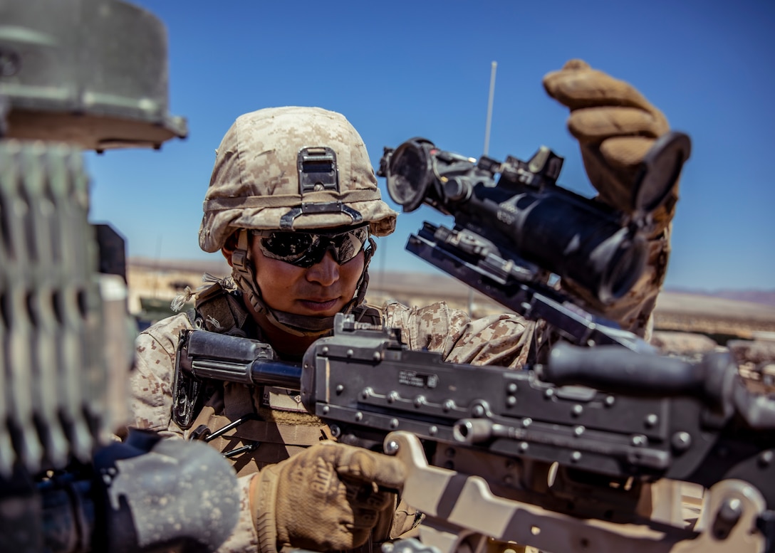 U.S. Marine Corps Lance Cpl. Christopher J. Kim, an infantry machine gunner with 1st Battalion, 25th Marine Regiment, 4th Marine Division, conducts a weapon maintenance check during Integrated Training Exercise 5-19 at Marine Corps Air Ground Combat Center Twentynine Palms, Calif., Aug. 12, 2019. ITX 5-19 is an essential component of the Marine Forces Reserve’s training and readiness cycle. It serves as the principle exercise for assessing a unit’s capabilities. (U.S. Marine Corps photo by Lance Cpl. Jose Gonzalez)