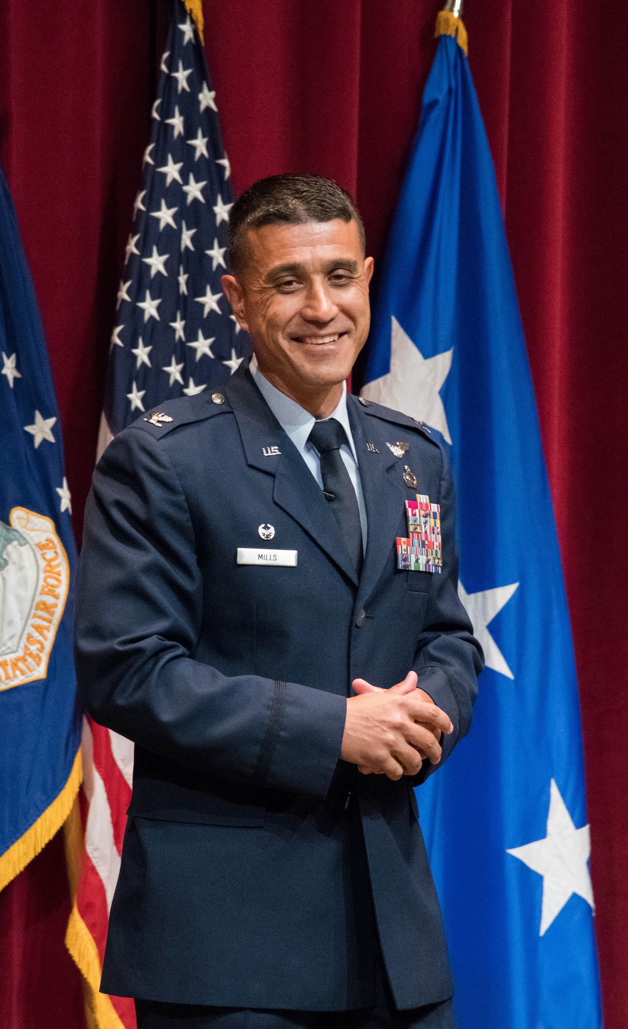 Col. Ricky L. Mills, Squadron Officer School commander and commandant, addresses a crowd during a change of command ceremony August 2, 2019, at Maxwell Air Force Base, Alabama. Mills assumed command from Col. Wayne W. Straw, who previously held the position from July, 2016, to August, 2019.