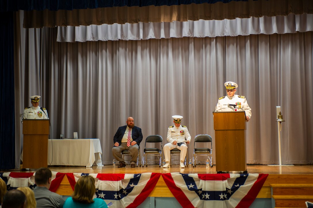 Capt. Brian D. Lawrence speaks during his retirement ceremony Aug. 12, which directly followed the Supervisor of Shipbuilding Gulf Coast change of command ceremony where Capt. Nathan A. Schneider relieved Lawrence of command.