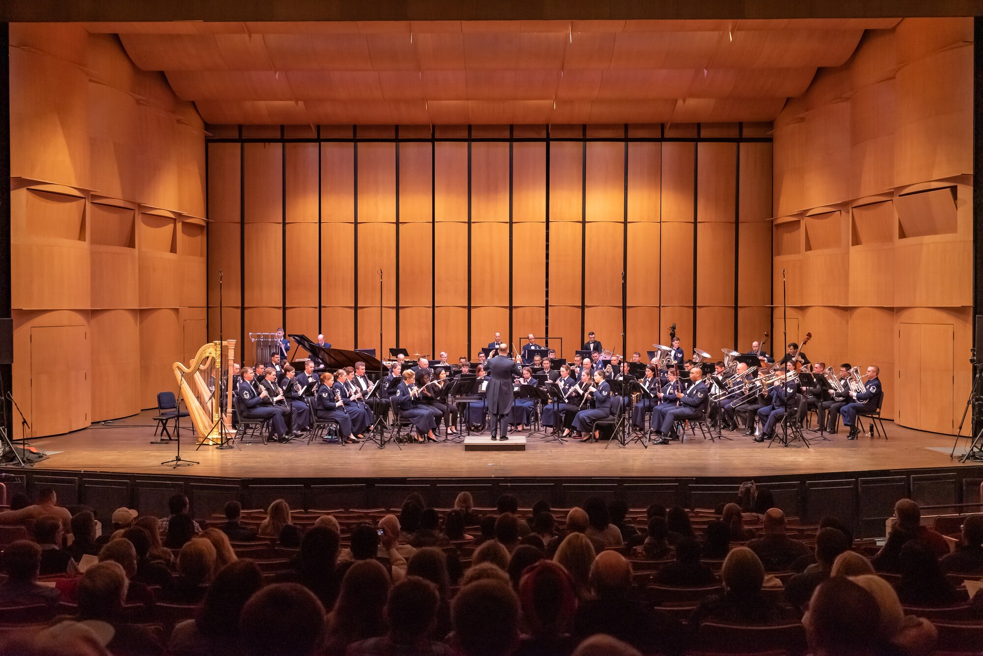 Col. Don Schofield conducts an ensemble consisting of The U.S. Air Force Concert Band and college students who were selected to perform for the 2019 Collegiate Symposium. The concert took place at the Rachel M. Schlesinger Concert Hall and Arts Center in Alexandria, Virginia, on Saturday, Feb. 2, 2019. (U.S. Air Force Photo by Master Sgt. Brandon Chaney)