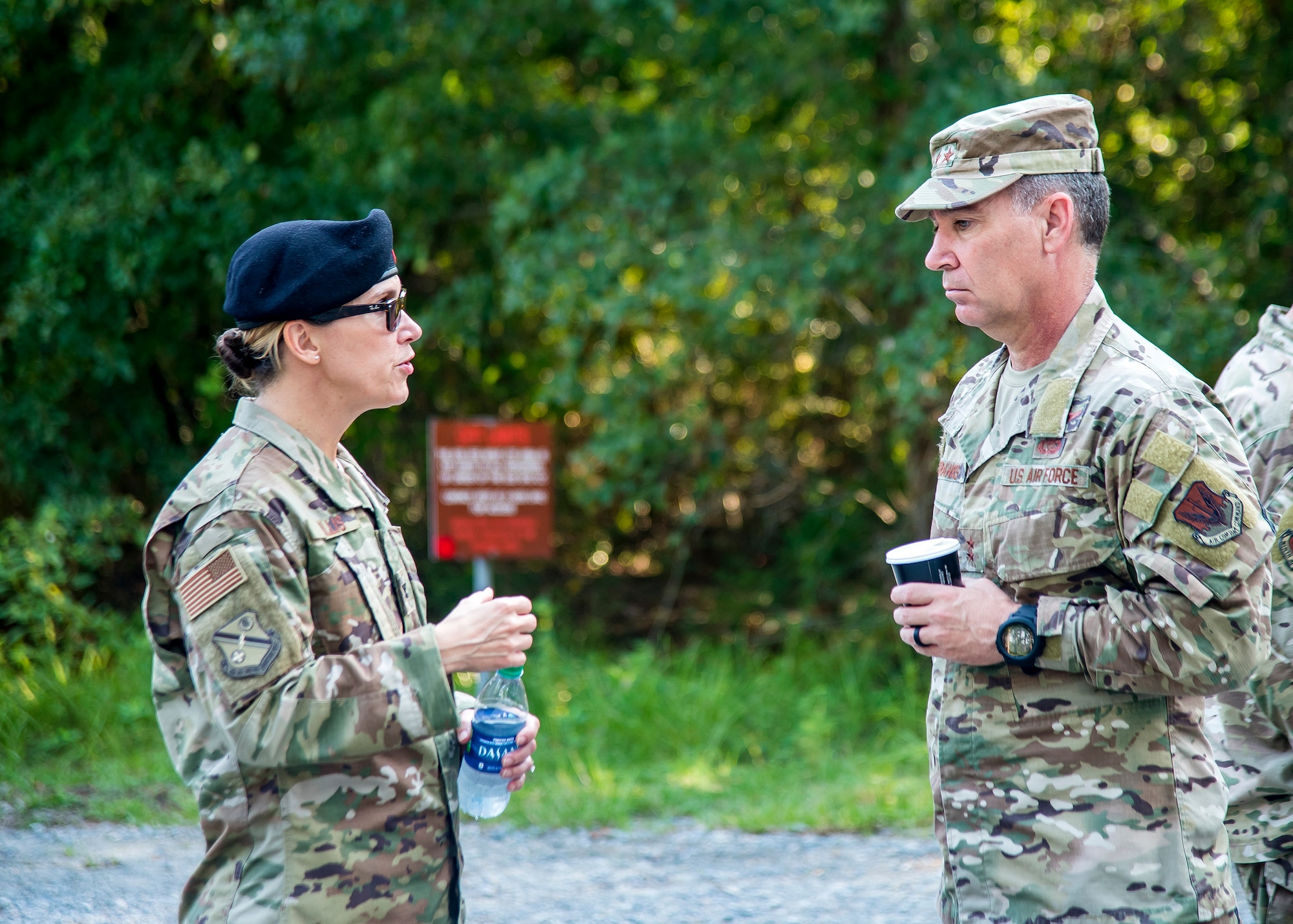U.S. Air Force Col. Danielle Willis, left, 93d Air Ground Operations Wing vice commander, speaks with Maj. Gen. Chad Franks, Ninth Air Force commander, Aug. 9, 2019, at Moody Air Force Base, Ga. Franks, who on separate occasions served as the commander for the 23d Wing and 347th Rescue Group, is a command pilot with more than 3,300 hours in multiple aircraft including HC-130J Combat King II and HH-60G Pave Hawk. (U.S. Air Force photo by Airman 1st Class Eugene Oliver)