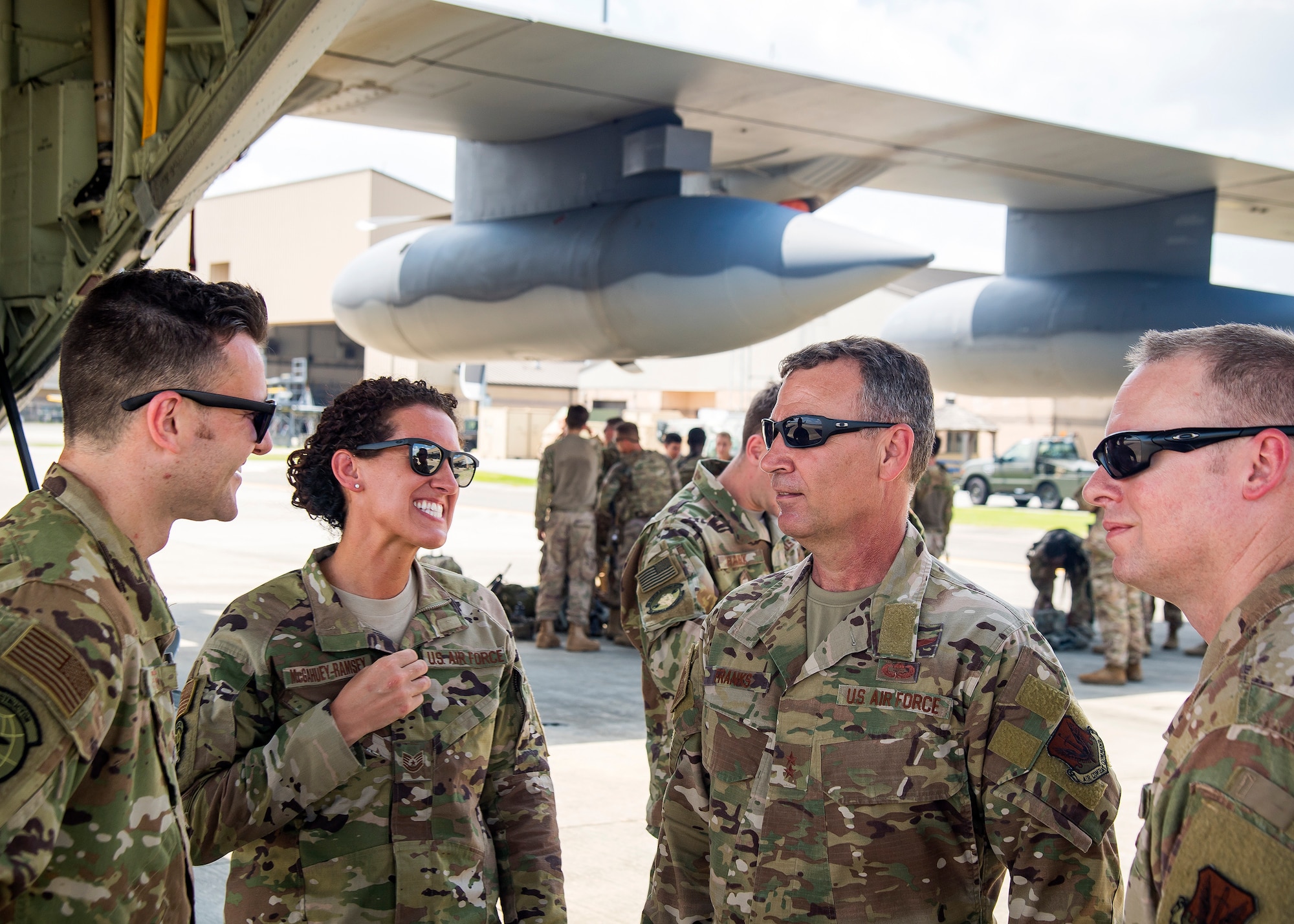 U.S. Air Force Maj. General Chad Franks, center, Ninth Air Force commander and Chief Master Sgt. Benjamin Hedden, Ninth AF Command Chief, speak with Airmen from the 71st Rescue Squadron at Moody Air Force Base, Ga., Aug. 9, 2019. Franks, who on separate occasions served as the commander for the 23rd Wing and 347th Rescue Group, is a command pilot with more than 3,300 hours in multiple aircraft including HC-130J Combat King II and HH-60G Pave Hawk. (U.S. Air Force photo by Airman 1st Class Eugene Oliver)