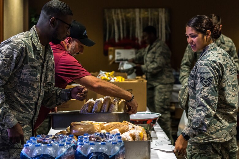 The 910th Airlift Wing’s Personnel Support for Contingency Operations team, made up of 910th Force Support Squadron Reserve Citizen Airmen, simulates a deployment processing line, Aug. 11, 2019, for Youngstown Air Reserve Station’s base-wide training exercise.