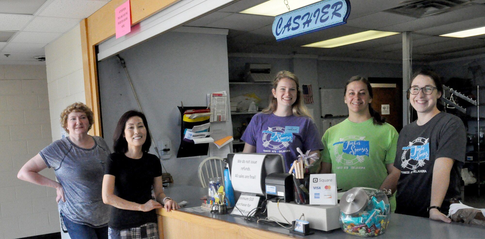 Volunteers from left, Judy Kirkland, Nami Taylor, Corinne Guyer, Nicole Kettlewell and Rachel Fialkowski keep the Tinker Thrift Shop thriving. The shop is located in Bldg. 6002 with the Auto Hobby Shop which is located in the same parking lot as the Airman & Family Readiness Center and the Gerrity Fitness Center. (U.S. Air Force photos/Megan Prather)