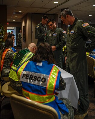 The 910th Airlift Wing’s Personnel Support for Contingency Operations team, made up of 910th Force Support Squadron Reserve Citizen Airmen, simulates a deployment processing line, Aug. 11, 2019, for Youngstown Air Reserve Station’s base-wide training exercise.