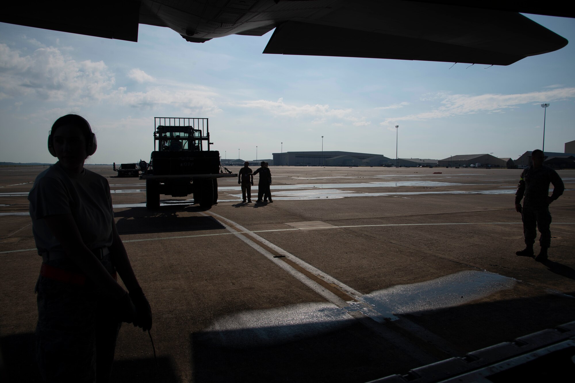 Senior Airman Alexis Docherty, 96th Aerial Port Squadron air transportation specialist, participates in static load training on a C-130J Hercules on August 4, 2019 at Little Rock Air Force Base, Arkansas. 96th APS Airmen train regularly to be prepared for deployment operations where they play a critical role in supplying the fight. LRAFB routinely provides the ability for our nation to project power, often going where others cannot, to support our military partners, intergovernmental agencies, and allied nations to achieve our national security objectives. (U.S. Air Force Reserve photo by Senior Airman Chase Cannon)