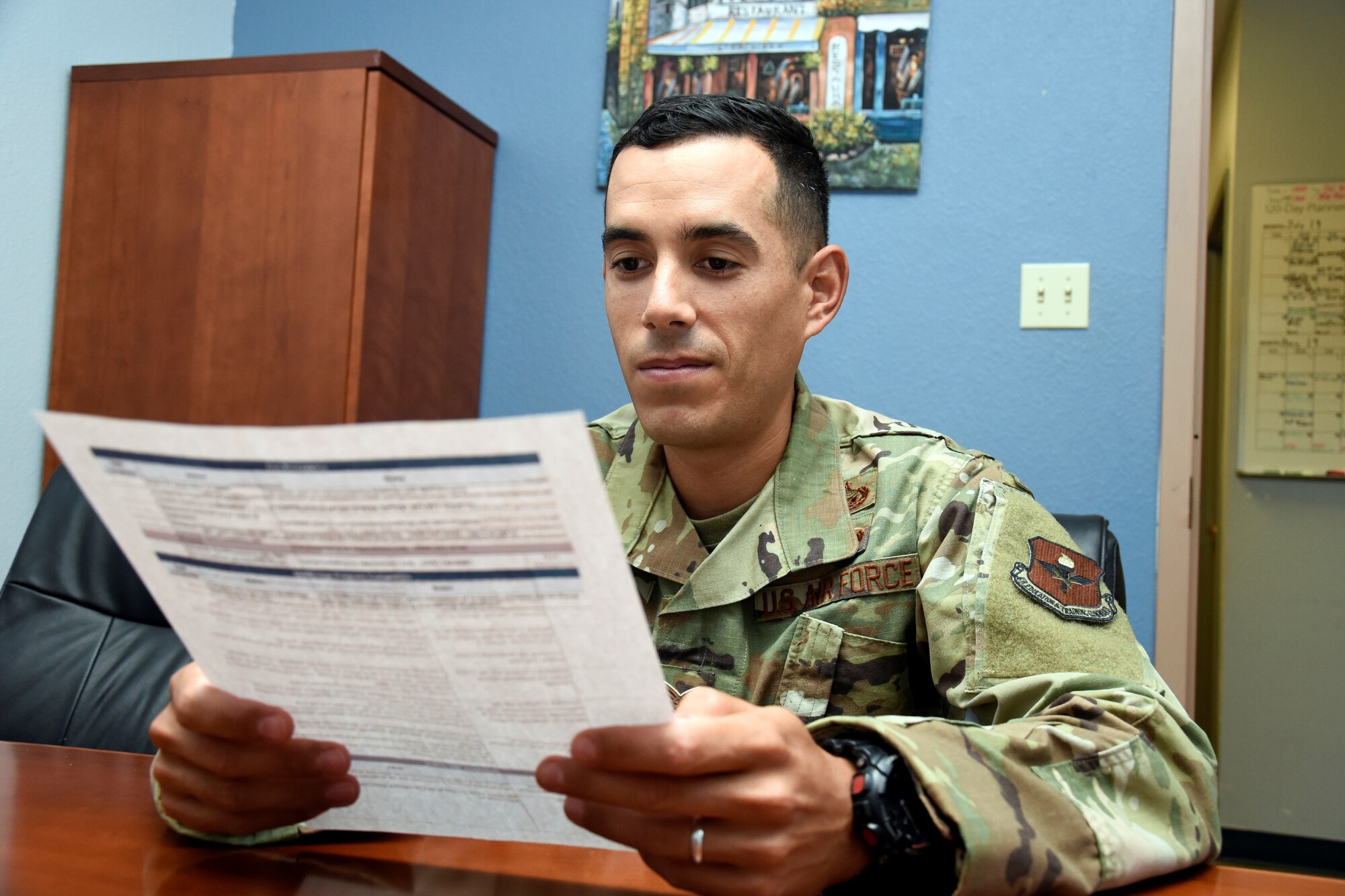 Staff Sgt. Tyler Collins, education office formal training manager, reads over the SkillsBridge vetting checklist to educate civilian companies about what the program entails July 29, 2019, at the Luke Air Force Base, Ariz.