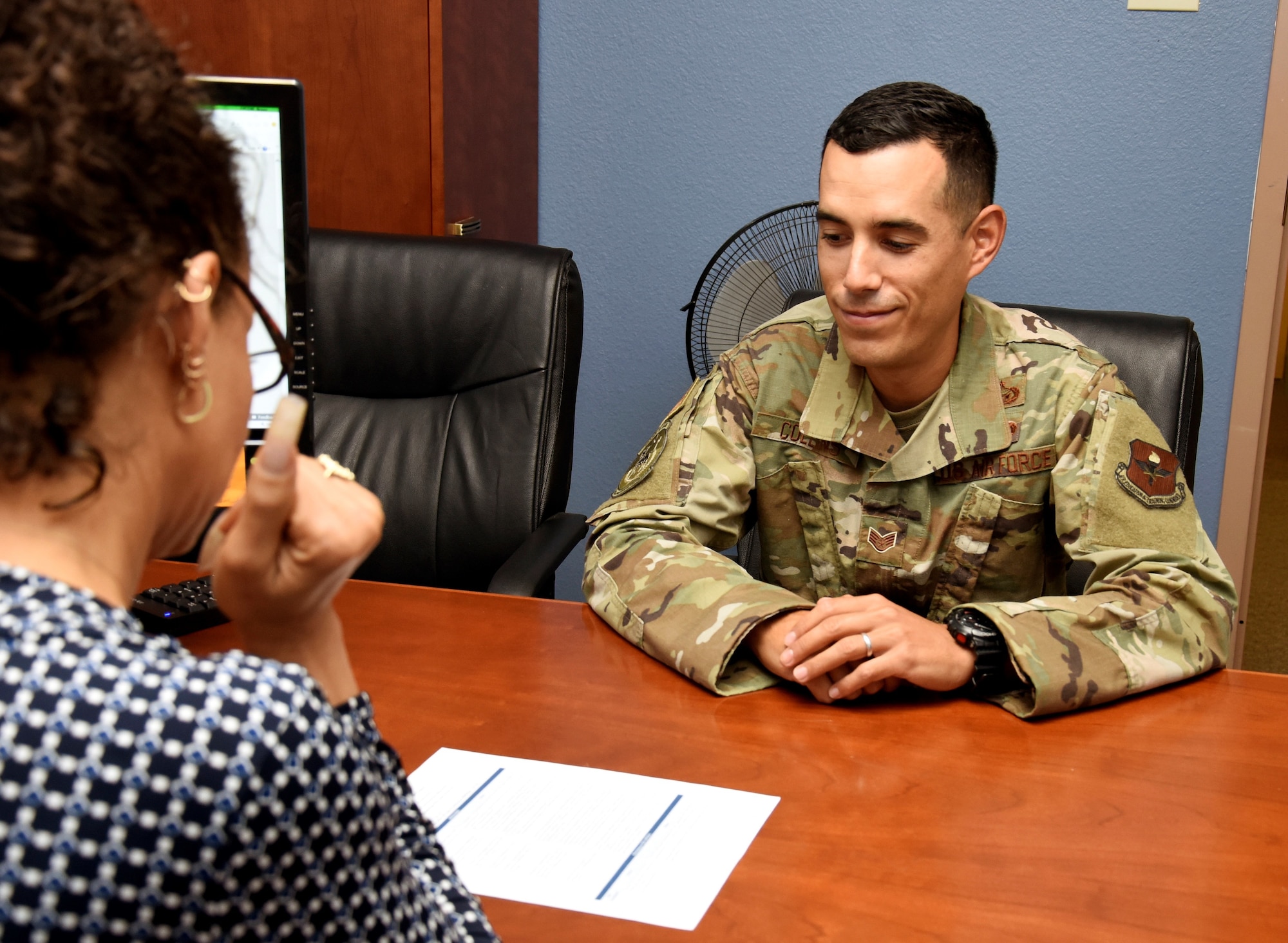 Staff Sgt. Tyler Collins, Education Office formal training manager, learns about the SkillsBridge program from Tina Clicquot Mack, education service specialist July 29, 2019, at Luke Air Force Base, Ariz.