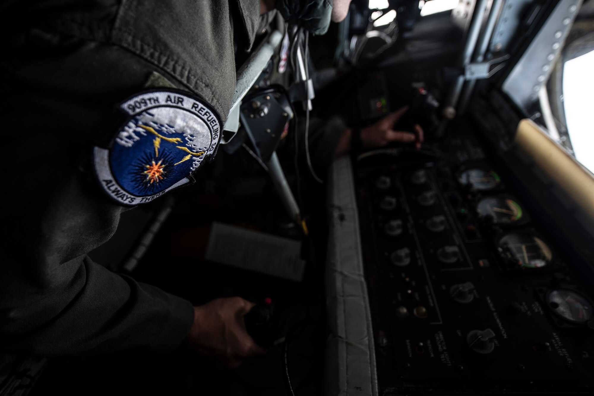 U.S. Air Force Staff Sgt. Andrew Liddane, 909th Air Refueling Squadron boom operator, prepares for in-flight refueling during RED FLAG-Alaska 19-3 at Eielson Air Force Base, Alaska, Aug. 7, 2019.