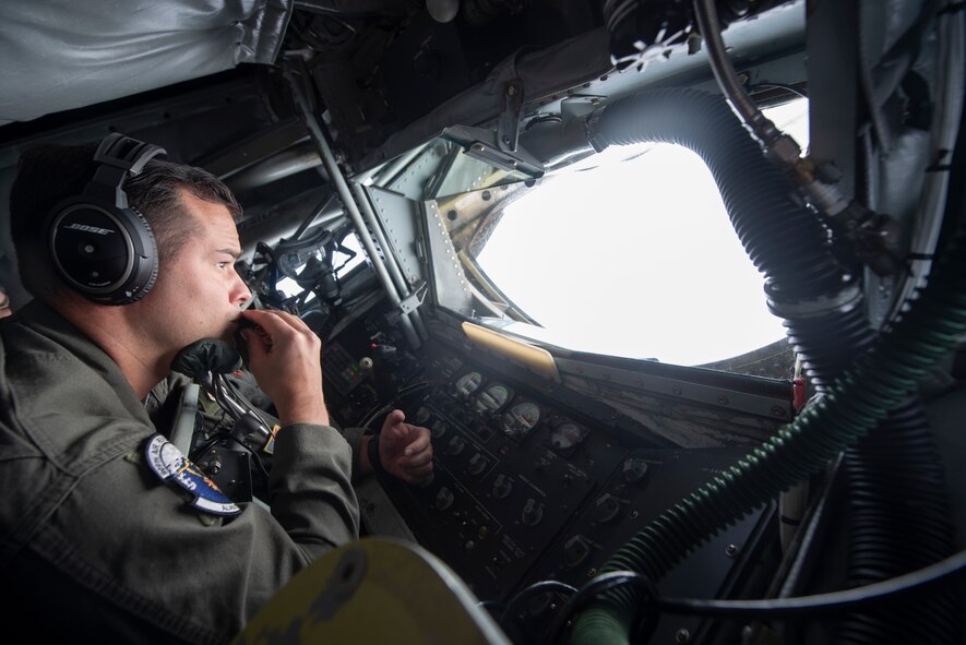 U.S. Air Force Staff Sgt. Andrew Liddane, 909th Air Refueling Squadron boom operator, prepares for in-flight refueling during RED FLAG-Alaska 19-3 at Eielson Air Force Base, Alaska, Aug. 7, 2019.