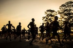 Airmen race against each other as part of a run and swim event at Eglin Air Force Base, Fla., Aug. 9, 2019.