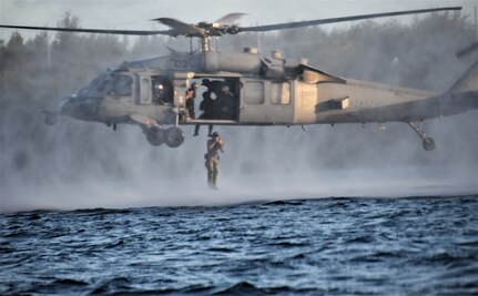 NAVAL BASE GUAM (April 15, 2019) Sailors assigned to Explosive Ordnance Disposal Mobile Unit (EODMU) 5, jump out of a MH-60S Seahawk helicopter, attached to Helicopter Sea Combat Squadron (HSC) 25, during a Cast and Recovery portion of the Naval Helicopter Rope Suspension Technique (HRST) course. EODMU-5 is assigned to Commander, Navy Expeditionary Forces Pacific, the primary expeditionary task force responsible for the planning and execution of coastal riverine operations, explosive ordnance disposal, diving engineering and construction, and underwater construction in the U.S. 7th Fleet area of operations.