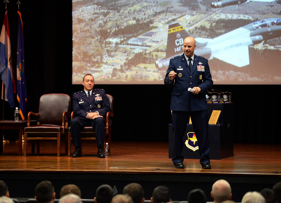 Col. Sloan Hollis, Air Force Inspection Agency commander at Kirtland Air Force Base, N.M., speaks to attendees during Specialized Undergraduate Pilot Training Class’s 19-19/20 graduation in the Kaye Auditorium July 26, 2019, on Columbus Air Force Base, Miss. Hollis reminisced on his experience as a Columbus AFB graduate 21 years ago, recalling a few key points he remembered from his grad speaker. (U.S. Air Force photo by Airman Hannah Bean)