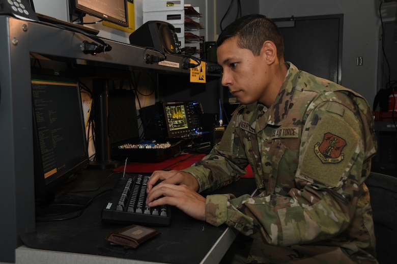 U.S. Air Force Technical Sgt. Andrew C. Merrylees, a radio frequency transmission system specialist from the 166th Airlift Wing, Delaware Air National Guard, inputs information into a computer program in New Castle, Delaware, June 6, 2019. Merrylees was recognized as the Air National Guard’s 2019 Outstanding Noncommissioned Officer of the Year and one of the Air Force’s 12 Outstanding Airmen of the Year for his innovative ideas in how to improve ANG cyberspace. (U.S. Air National Guard photo by Master Sgt. David J. Fenner)