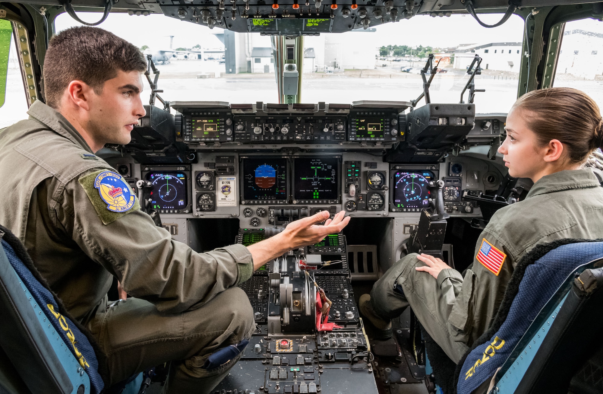 First Lt. Stephen Muer, 3rd Airlift Squadron C-17A Globemaster III pilot, talks with Air Force Junior Reserve Officers’ Training Corps cadet Amanda Pieraccini on the flight deck of a C-17A Globemaster III July 23, 2019, at Dover Air Force Base, Del. Pieraccini was one of the 23 cadets who attended the eight-week AFJROTC Summer Flight Academy at Delaware State University in Dover. Pieraccini is a cadet with AFJROTC Detachment NY-932, Aviation High School, Long Island City, N.Y. (U.S. Air Force photo by Roland Balik)
