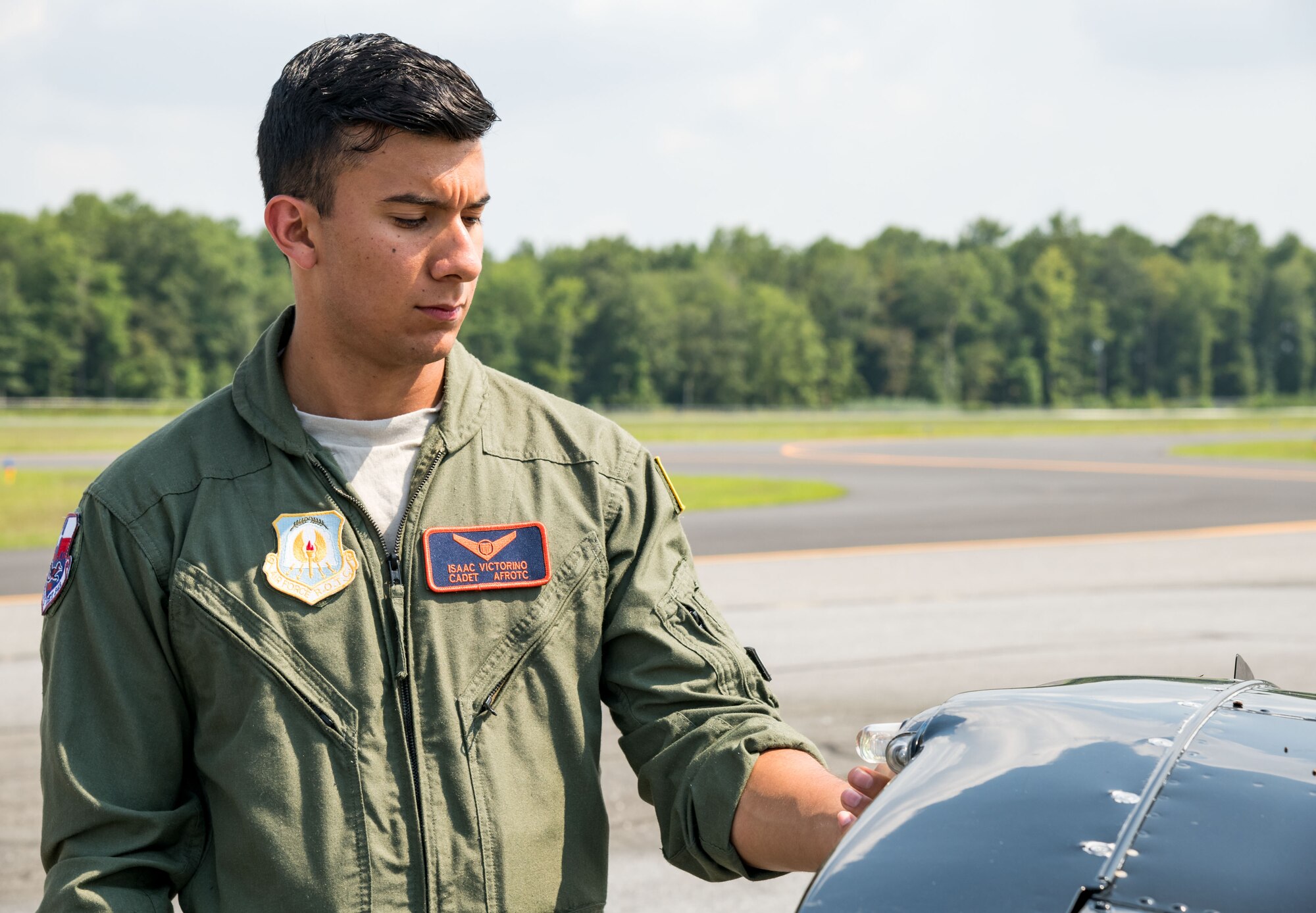 Air Force Reserve Officers’ Training Corps cadet Isaac Victorino, checks the left wing strobe light on a Piper Warrior II during the preflight of the aircraft Aug. 6, 2019, at Delaware Airpark in Cheswold, Del. Victorino and Mohammad Ahmed, Delaware State University certified flight instructor, flew around the airpark and practiced skills learned during the eight-week AFJROTC Summer Flight Academy held at DSU in Dover. Victorino is a cadet with AFROTC Detachment 842, University of Texas at San Antonio. (U.S. Air Force photo by Roland Balik)