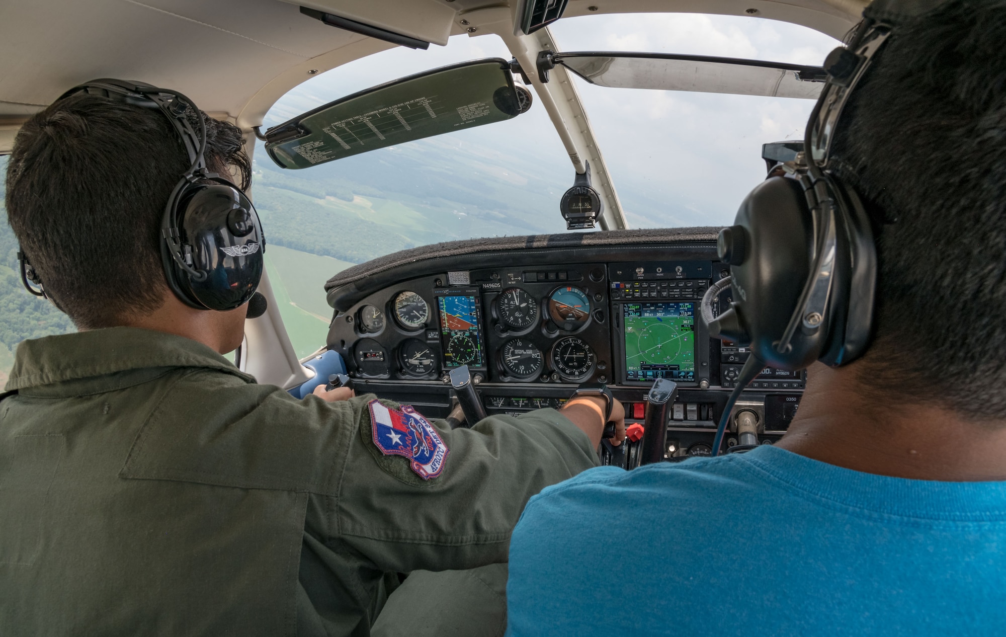 In the pilot’s seat, Air Force Junior Reserve Officers’ Training Corps cadet Isaac Victorino, prepares to land the Piper Warrior II Aug. 6, 2019, at Delaware Airpark in Cheswold, Del. Victorino and Mohammad Ahmed, Delaware State University certified flight instructor, flew around the airpark and practiced skills learned during the eight-week AFJROTC Summer Flight Academy held at DSU in Dover. Victorino is a cadet with AFROTC Detachment 842, University of Texas at San Antonio. (U.S. Air Force photo by Roland Balik)