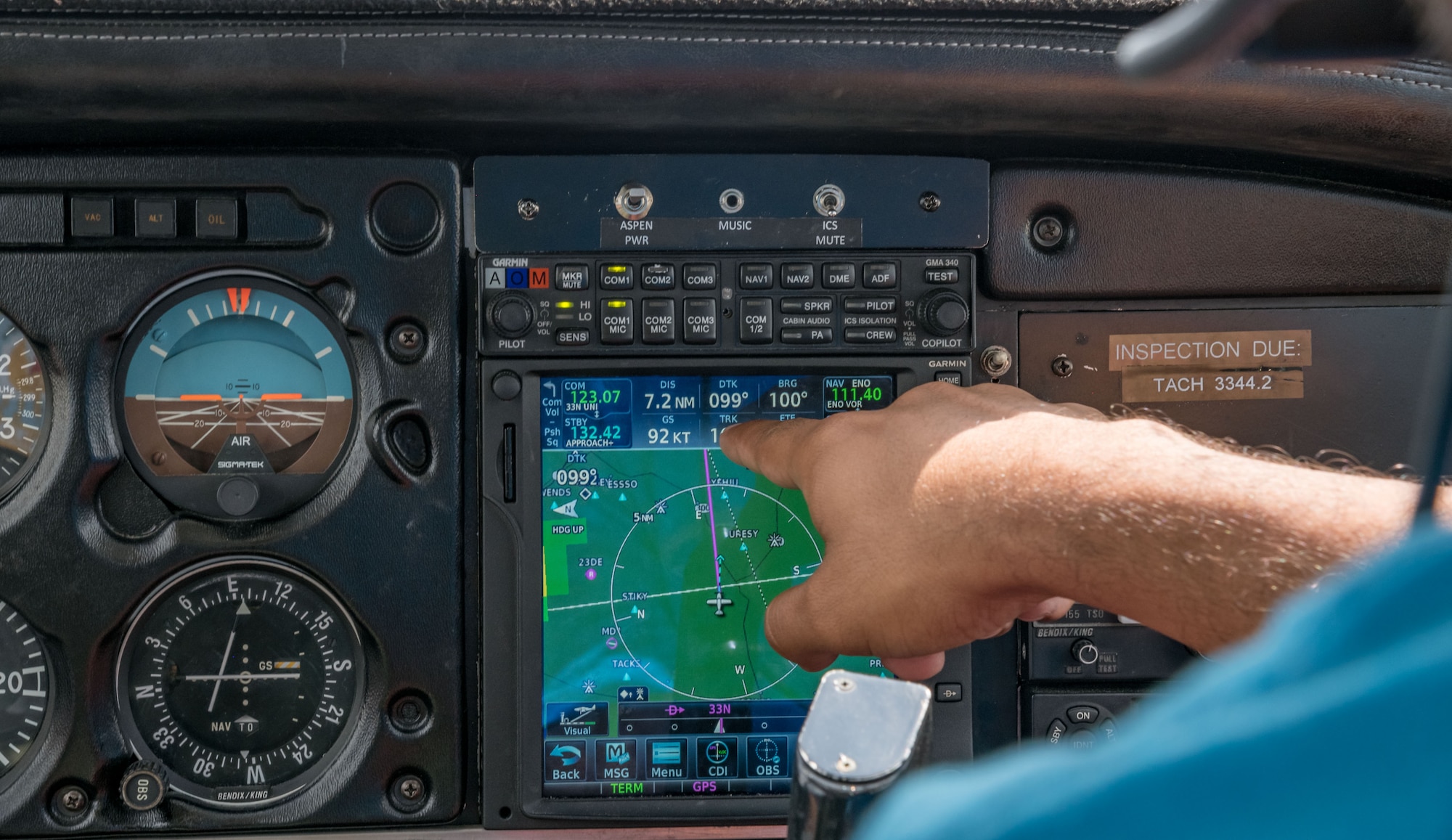 Mohammad Ahmed, Delaware State University certified flight instructor, points out flight instrumentation to Air Force Junior Reserve Officers’ Training Corps cadet Isaac Victorino, as he flies the Piper Warrior II in for a touch and go landing Aug. 6, 2019, at Delaware Airpark in Cheswold, Del. Under the guidance of Ahmed, Victorino flew around the airpark and practiced skills he learned during the eight-week AF JROTC Summer Flight Academy held at DSU in Dover. Victorino is a cadet with AFROTC Detachment 842, University of Texas at San Antonio. (U.S. Air Force photo by Roland Balik)