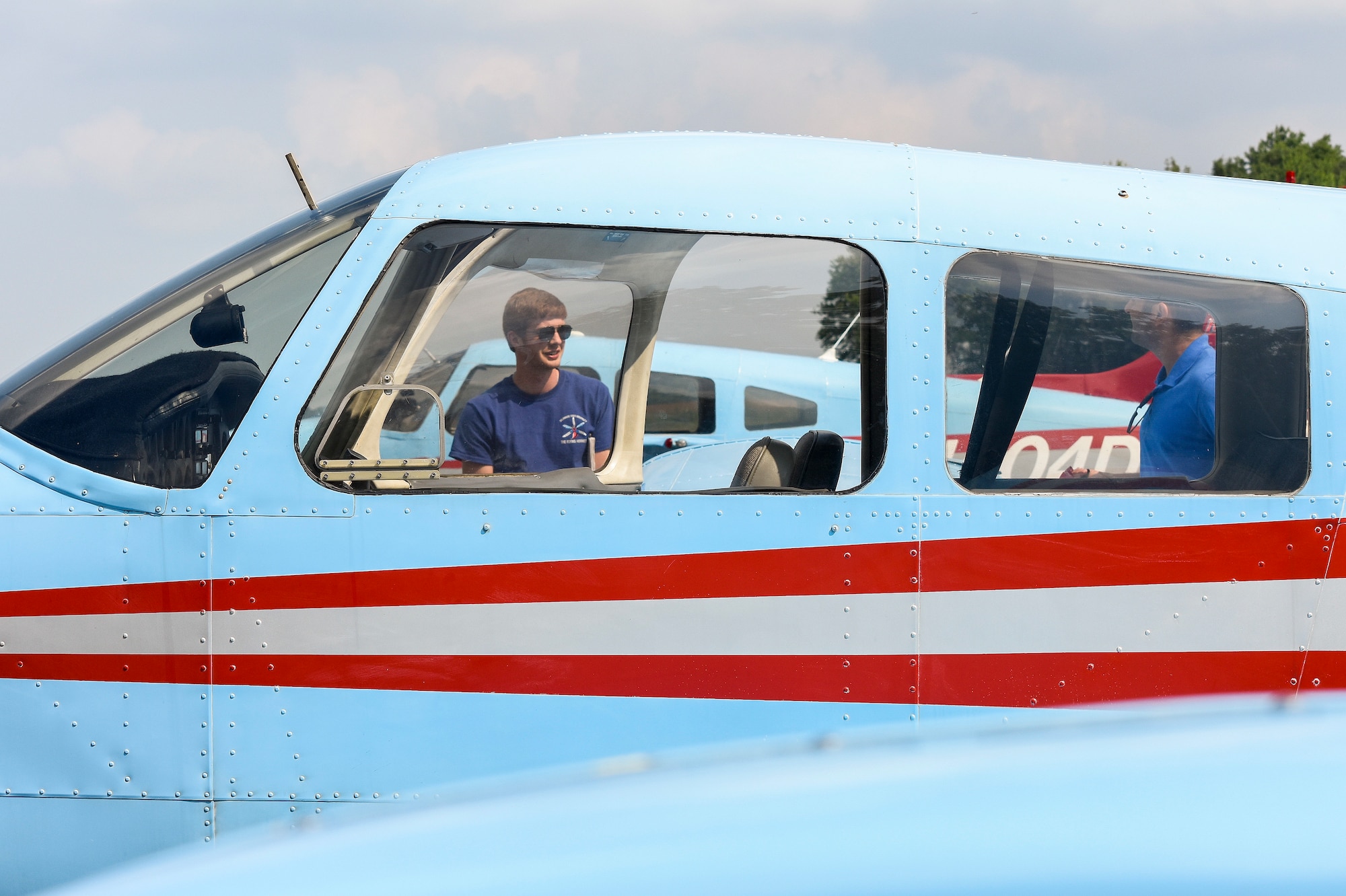 Air Force Junior Reserve Officers’ Training Corps cadet Aidan Post, inspects a Piper Warrior aircraft prior to flight Aug. 6, 2019, at Delaware Airpark in Cheswold, Del. Post and Kyle Longhany, Delaware State University certified flight instructor, prepared the aircraft for flight. Post is a cadet with AFJROTC Detachment WV-941, Fairmont State University, Fairmont, W.Va. (U.S. Air Force photo by Rachel Bonney)