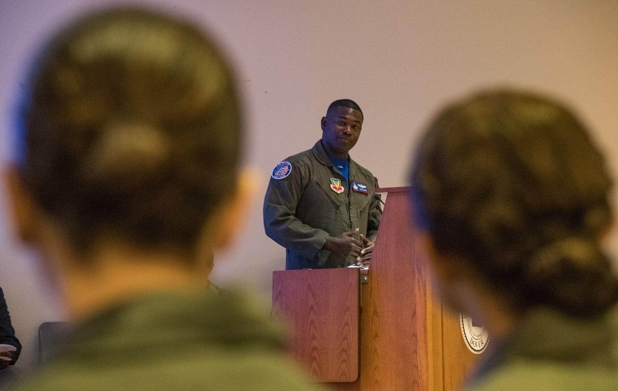 Maj. Paul “Loco” Lopez, U.S. Air Force F-22 Raptor Demonstration Team commander and pilot stationed at Joint Base Langley-Eustis in Hampton, Va., speaks to cadets of the Air Force Junior Reserve Officers’ Training Corps Summer Flight Academy during a graduation ceremony held on Aug. 8, 2019, at Delaware State University, Dover, Del. Lopez expressed words of encouragement and praised them on their accomplishment before they received their wings and private pilot’s certification during the formal part of the ceremony. (U.S. Air Force photo by Roland Balik)