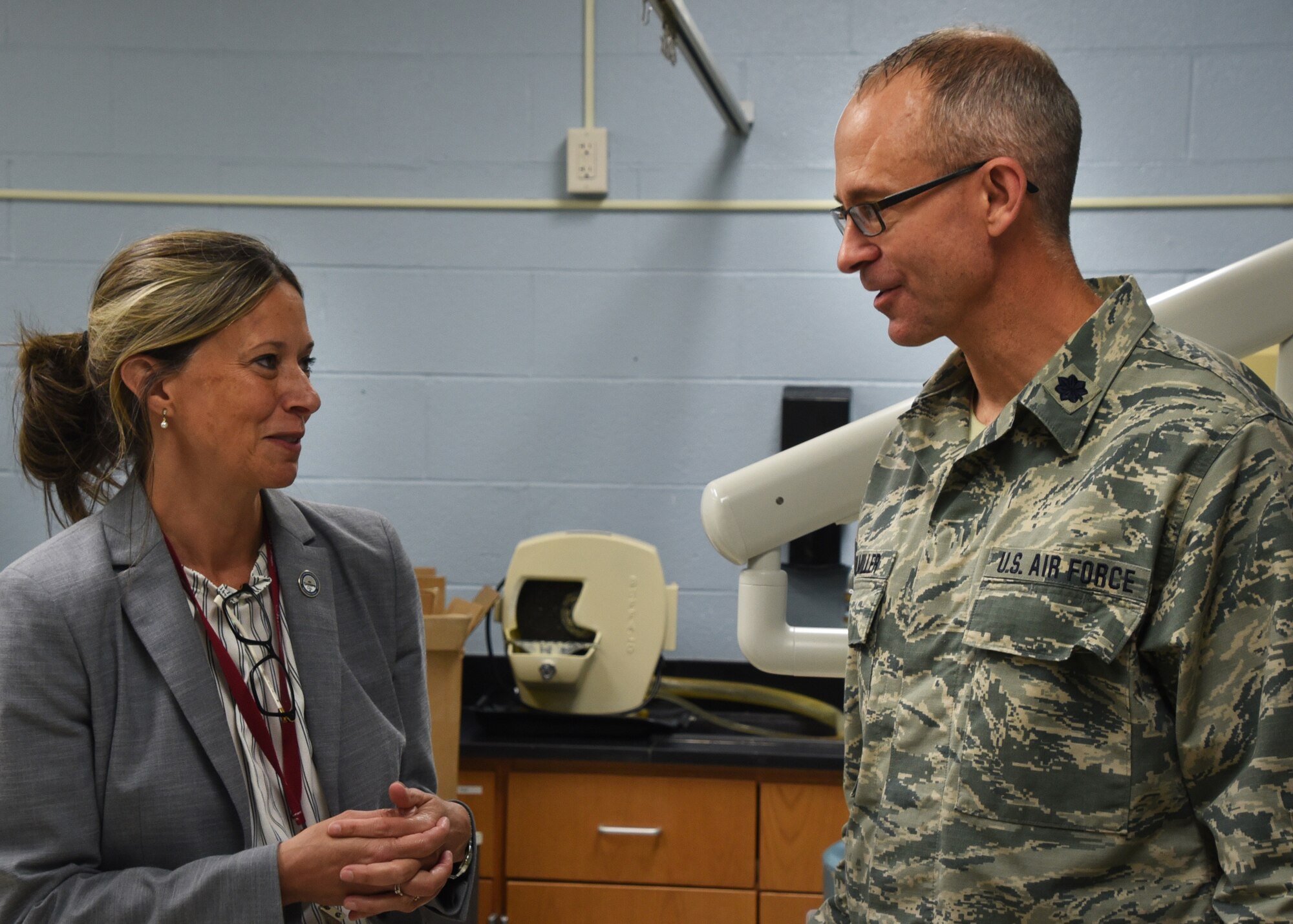 Ohio Department of Health lead Medical Doctor Amy Acton discusses healthcare with U.S. Air National Guard Lt. Col. Timothy Stuhlmiller, Dentist from the 179th Airlift Wing Medical Group, during GuardCare Weekend Aug. 11, 2019, at the Buckeye Career Center, New Philadelphia, Ohio. During the event both service members from the Ohio Army and Air National Guard provided health services to the local and surrounding New Philadelphia population. (U.S. Air National Guard photo by Senior Airman Gwendalyn Smith)