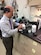 AFRL Materials and Manufacturing Assistant Chief Engineer, Dr. Larry Brott, displays infrared powder used to form pellets in the creation of infrared technologies for battlefield communication and training. (U.S. Air Force photo/Donna Lindner)