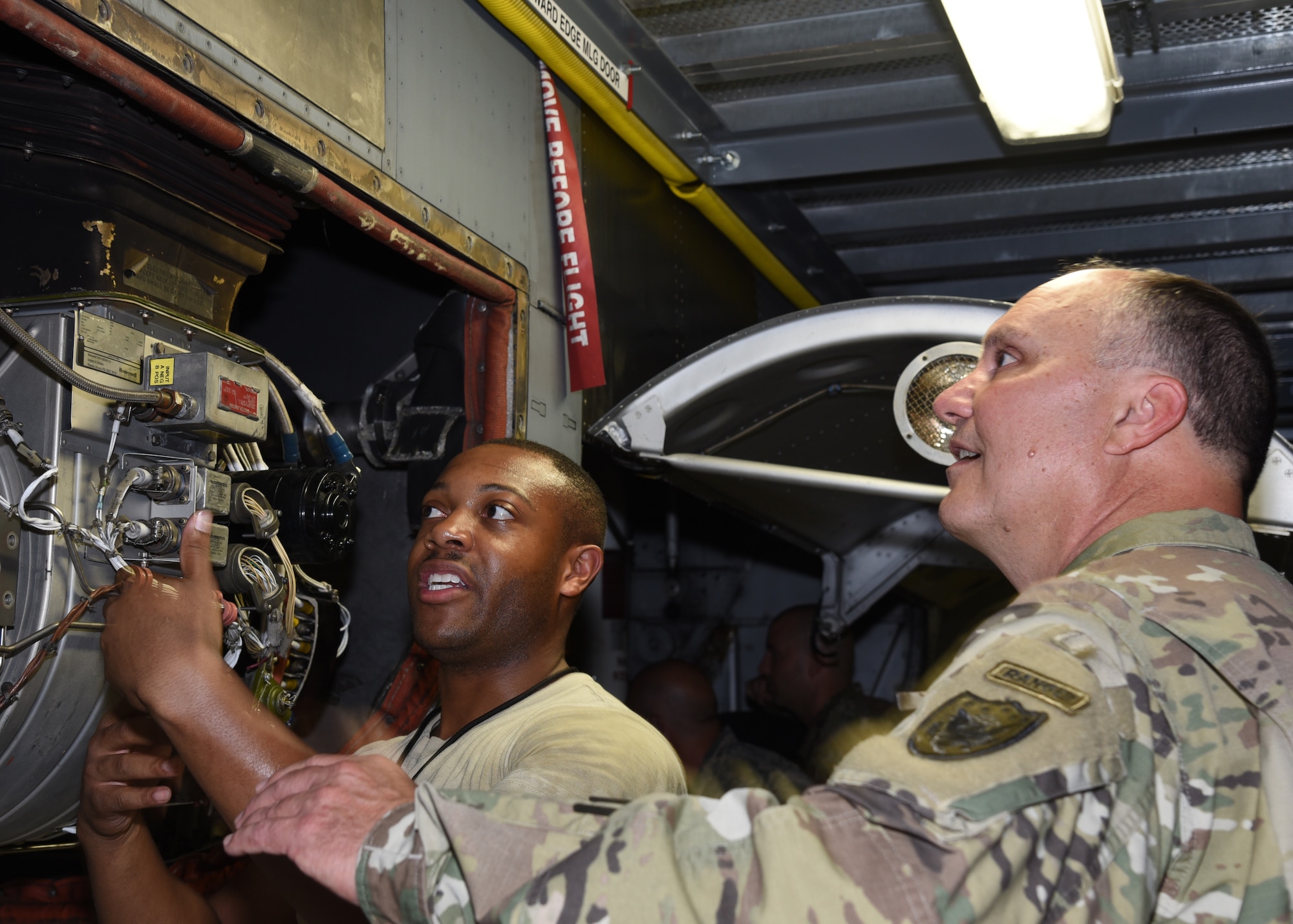 U.S. Army Maj. Gen. John E. Cardwell, Special Assistant to the Commander, North American Aerospace Command and U. S. Northern Command for Reserve Matters, visited the 403rd Wing at Keesler Air Force Base, Mississippi, Aug. 13, 2019. The general toured a WC-130J Super Hercules aircraft, which was undergoing a routine inspection, and was also briefed on the job duties of the 403rd Aircraft Maintenance Squadron isochronal inspection dock by Staff Sgt. Robert Ricks, 403rd AMXS aerospace propulsion journeyman. Cardwell was also briefed on the different missions of the 403rd Wing. (U.S. Air Force photo by Jessica L. Kendziorek)