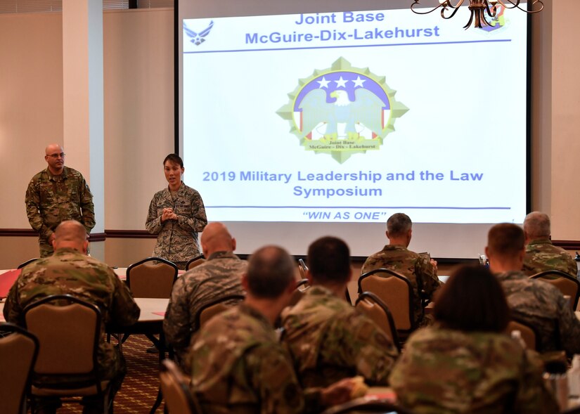 U.S. Air Force Col. Bridgette Gigliotti, Joint Base McGuire-Dix-Lakehurst, New Jersey, commander, and Chief Master Sgt. Bill Fitch, Joint Base MDL command chief, provide opening remarks to the Military Leadership and the Law Symposium held at Tommy B’s Aug. 13, 2019. Gigliotti and Fitch recalled prior experiences where Airmen ultimately were removed from service, but made sure that individuals had a plan on where they were going, how they would get there and if they had living arrangements so they didn’t end up on the streets. Both emphasized that even with the mistakes those Airmen made, that they were still a fellow wingman till their last day in service. (U.S. Air Force photo by Senior Airman Jake Carter)