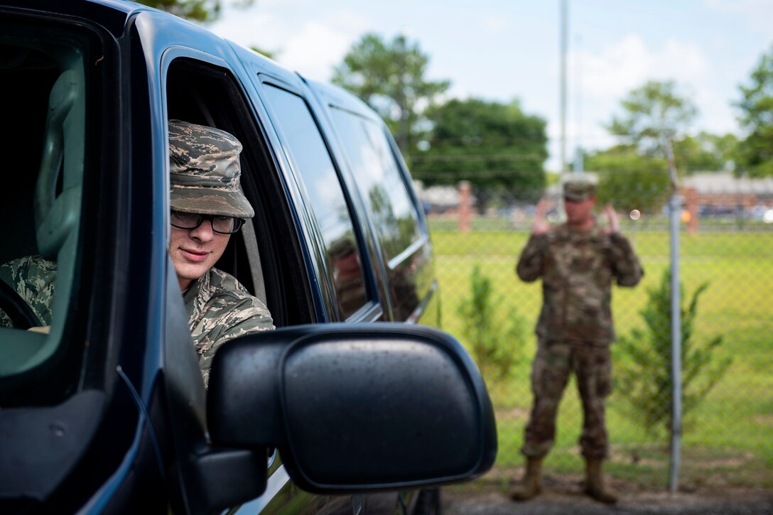 Senior Airman Alex Koch, 23d Logistics Readiness Squadron ground transportation operator, checks break lights during a vehicle inspection, Aug. 12, 2019, at Moody Air Force Base, Ga. The ground transportation flight inspects all of their 56 vehicles weekly to ensure they remain operational, and by performing routine inspections, they’re able to maintain the longevity of their fleet. (U.S. Air Force photo by Senior Airman Erick Requadt)