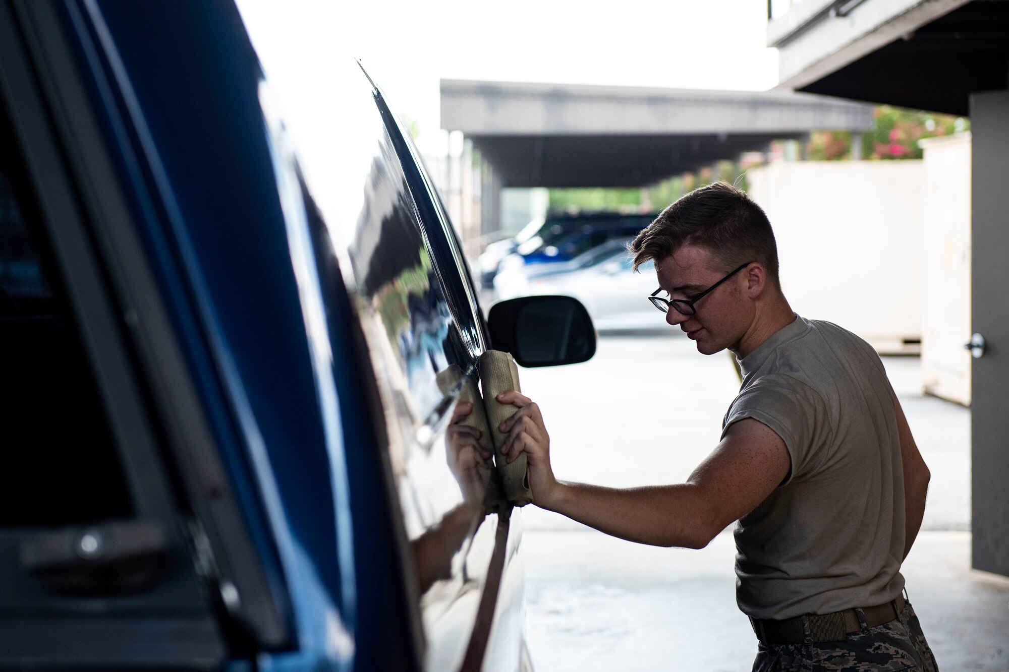 Senior Airman Alex Koch, 23d Logistics Readiness Squadron ground transportation operator, dries off a truck during a vehicle inspection, Aug. 12, 2019, at Moody Air Force Base, Ga. The ground transportation flight inspects all of their 56 vehicles weekly to ensure they remain operational, and by performing routine inspections, they’re able to maintain the longevity of their fleet. (U.S. Air Force photo by Senior Airman Erick Requadt)