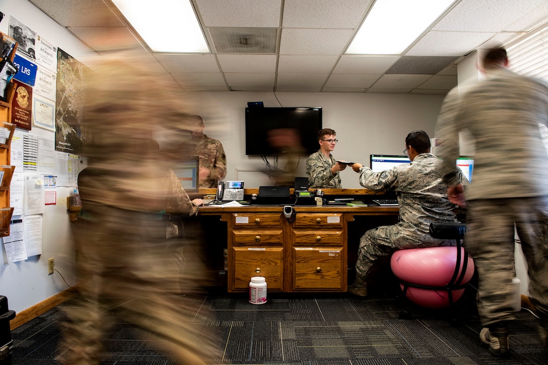 Airmen from the 23d Logistics Readiness Squadron ground transportation flight perform dispatch procedures, Aug. 14, 2019, at Moody Air Force Base, Ga. All of the information ground transportation needs to support the base is first processed through the dispatch section, where it’s disseminated to the appropriate areas. Having a centralized point of information flow serves to sustain continuity throughout the sections to ensure optimal communication within the flight. (U.S. Air Force photo by Senior Airman Erick Requadt)