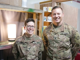 1st Lt. Lori Blakeway and Sgt. Cory Nottingham, 1972d Medical Detachment, stand for a photo at Erbil, Iraq, July 29, 2019.