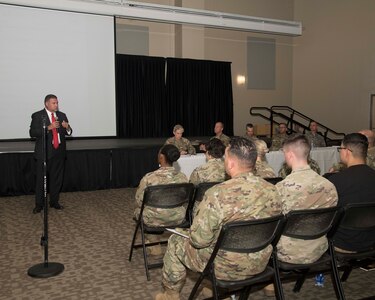 Richard Trevino, the 502nd Civil Engineering Group director, discusses the steps being taken to combat mold with residents of JBSA-Fort Sam Houston’s barracks, ships, and dorms during a gathering on Aug. 13. The meeting offered service members an opportunity to directly address issues about their housing with senior leadership. (Photo by Tristin English)